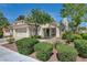A charming single-story home with well-maintained landscaping and a cozy front porch at 2024 Riva Del Garda Pl, Las Vegas, NV 89134