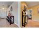 Inviting hallway with hardwood floors and decorative accents at 2024 Riva Del Garda Pl, Las Vegas, NV 89134