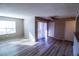Bright living room with wood-look floors, lots of light and neutral paint at 2300 E Silverado Ranch Blvd # 1180, Las Vegas, NV 89183