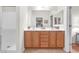 Bathroom with double sinks, spacious vanity, and walk-in shower at 2444 Gamma Ray Pl, Henderson, NV 89044