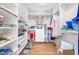 Organized walk-in closet with custom shelving and ample storage space at 2444 Gamma Ray Pl, Henderson, NV 89044
