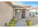 Inviting front entrance with desert landscaping leading to the main door at 2444 Gamma Ray Pl, Henderson, NV 89044