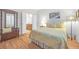 Comfortable main bedroom with a decorative bedspread and a hall tree at 2444 Gamma Ray Pl, Henderson, NV 89044