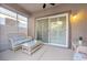 Cozy covered patio with wicker furniture, creating an inviting outdoor space at 2444 Gamma Ray Pl, Henderson, NV 89044