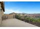 This balcony features desert landscaping and metal rod railing at 2583 Hazelburn Ave, Henderson, NV 89044