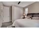 Bedroom with a large bed and mirrored closet at 2583 Hazelburn Ave, Henderson, NV 89044