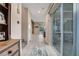 Bright hallway connecting interior spaces with access to a private patio at 2583 Hazelburn Ave, Henderson, NV 89044