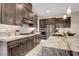This modern kitchen offers ample cabinet space, stainless steel appliances, and a stylish island counter at 2583 Hazelburn Ave, Henderson, NV 89044