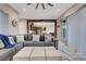 Spacious living room with open floor plan to the kitchen and patio access at 2583 Hazelburn Ave, Henderson, NV 89044