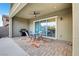 Cozy patio with a table, grill, and sliding doors that let you appreciate backyard views at 2583 Hazelburn Ave, Henderson, NV 89044