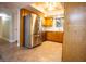 Kitchen featuring stainless steel appliances, tile flooring, and wooden cabinetry at 2611 S Durango Dr # 102, Las Vegas, NV 89117