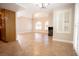 Bright and airy living space featuring tile flooring, neutral walls, and an inviting fireplace feature at 2611 S Durango Dr # 102, Las Vegas, NV 89117