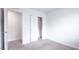 Bedroom with neutral carpet and white walls and closet at 3542 Arcadian King Ave, Las Vegas, NV 89106