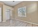 Bedroom features a large closet with mirror doors and a window at 3544 Desert Cliff St # 102, Las Vegas, NV 89129