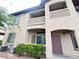 Multi-story building with private balconies and well-maintained landscaping at 3544 Desert Cliff St # 102, Las Vegas, NV 89129