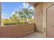This patio offers views of lush trees and foliage at 3544 Desert Cliff St # 102, Las Vegas, NV 89129
