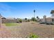 Spacious backyard featuring low-maintenance landscaping and a privacy fence, perfect for outdoor living at 3568 Antigua Ave, Las Vegas, NV 89121