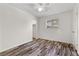 Neutral bedroom features wood-look floors and a standard-sized window at 3568 Antigua Ave, Las Vegas, NV 89121
