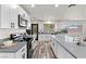 Modern kitchen features an island and stainless steel appliances at 3568 Antigua Ave, Las Vegas, NV 89121