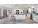 Open kitchen with an island and modern white cabinetry at 3568 Antigua Ave, Las Vegas, NV 89121