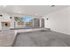 Open living room with large windows offering natural light at 3568 Antigua Ave, Las Vegas, NV 89121