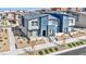 Aerial shot of new townhomes with contemporary designs, landscaping, and a well-planned community layout at 3725 Celesta Vista Ave, Henderson, NV 89044