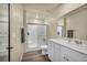 Bright bathroom with a glass-enclosed shower, single vanity, and modern fixtures at 3725 Celesta Vista Ave, Henderson, NV 89044