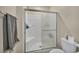 This bathroom has a glass-enclosed shower, and modern toilet at 3725 Celesta Vista Ave, Henderson, NV 89044