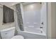 Clean bathroom featuring a tub and shower combination with a decorative curtain at 3725 Celesta Vista Ave, Henderson, NV 89044