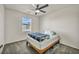 This bedroom has a simple bed frame, neutral walls, and carpeted flooring at 3725 Celesta Vista Ave, Henderson, NV 89044