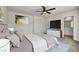 Serene bedroom with stylish decor, a TV, and a doorway to the ensuite bathroom at 3725 Celesta Vista Ave, Henderson, NV 89044