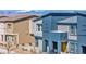 View of new two-story townhouses showcasing modern architecture, neutral tones, and mountain views at 3725 Celesta Vista Ave, Henderson, NV 89044
