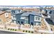 Modern two-story townhome featuring desert landscaping and a stylish blue-gray exterior at 3725 Celesta Vista Ave, Henderson, NV 89044