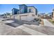Three-car garage with modern design and xeriscaped surroundings at 3725 Celesta Vista Ave, Henderson, NV 89044