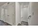 Hallway featuring a closet and a staircase with neutral colored walls at 3725 Celesta Vista Ave, Henderson, NV 89044