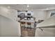 Open kitchen with modern appliances, a spacious island, and barstool seating at 3725 Celesta Vista Ave, Henderson, NV 89044