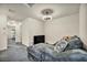 Inviting living room with recessed lighting and a comfy gray sectional sofa at 3725 Celesta Vista Ave, Henderson, NV 89044