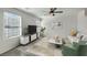 Bright living area featuring large windows, sleek furniture, and modern decor at 3725 Celesta Vista Ave, Henderson, NV 89044