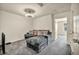 Cozy living room featuring plush gray carpet and a comfortable sectional sofa at 3725 Celesta Vista Ave, Henderson, NV 89044