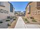 A landscaped common area between units offering a serene and inviting outdoor space at 3725 Celesta Vista Ave, Henderson, NV 89044
