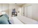 Cozy bedroom showcasing a comfortable bed with a view into the connected bathroom at 422 Tanita Ct, Las Vegas, NV 89123