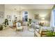 Spacious living room boasts natural light, vaulted ceilings and views into the kitchen at 422 Tanita Ct, Las Vegas, NV 89123