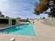 Community pool featuring crystal clear water and a spacious sun deck for relaxing and enjoying the weather at 422 Tanita Ct, Las Vegas, NV 89123
