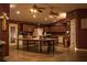 Spacious kitchen featuring custom wood cabinets, wood-look flooring and large center island at 4745 Gunlock Cir, North Las Vegas, NV 89031