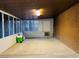 Enclosed patio area offers versatile space with rustic wall texture, a unique design element at 4745 Gunlock Cir, North Las Vegas, NV 89031