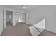 Bright bedroom features plush carpeting and mirrored closet at 5000 Forest Oaks Dr, Las Vegas, NV 89149
