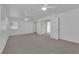 Spacious bedroom features plush carpeting and bright doorway at 5000 Forest Oaks Dr, Las Vegas, NV 89149