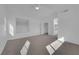 Bright main bedroom with plush carpet and large windows at 5000 Forest Oaks Dr, Las Vegas, NV 89149