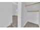A walk-in closet with hardwood flooring and shelving at 5000 Forest Oaks Dr, Las Vegas, NV 89149
