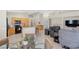 Open floor-plan that combines the kitchen, dining, and living areas at 5218 Blue Gum Ct, Las Vegas, NV 89148